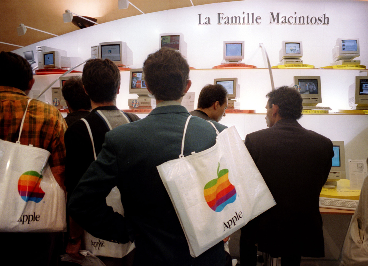 People attend the annual Apple Expo at the CNIT center at La Defense in Paris September 15. Apple p..